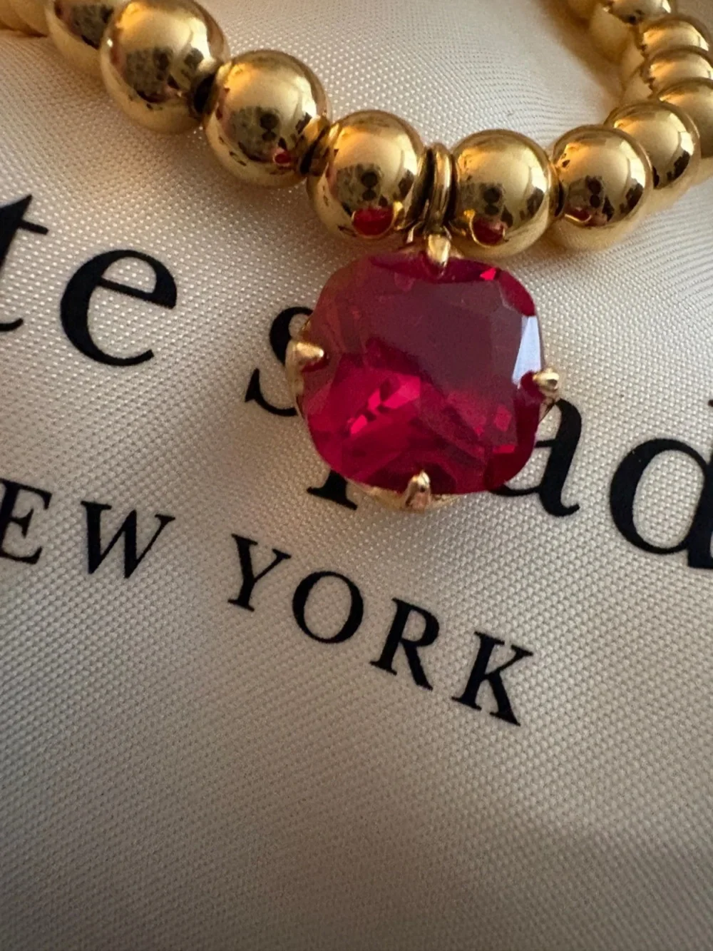 kate spade Gold Beaded Bracelet with Red Gem Charm - Picture 6 of 6